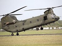 Landing on two wheels, then taxying forward and backwards in this attitude before lifting off backwards