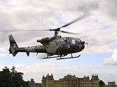 The Gazelle lifts off in front of the Palace as the Team bid farewell to a very successful show