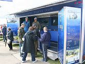 The front doors become fold out panels full of Army Air Corps information. Here John and Ed explain the finer points of the display.