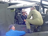 JK was shown around the awesome Apache by Major Howard Floyd and Colin, and was quite at home in the cockpit