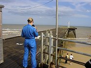 Laura in commentator mode on the pier.
