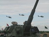 Somehow, the final flypast looked more fitting when seen either side of a self-propelled gun!