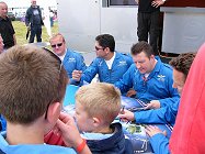 ....as were the rest of the Team signing posters.