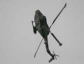 Two views of Ed and Graham in the vertical, first in a loop....