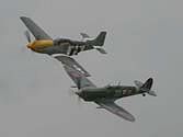 Another close pair in the display, the P-51D Mustang and the Spitfire Mk XI.