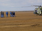 The Team began their dirt dive on the beach, watched by the ground crew sheltering from the wind in the Lynx