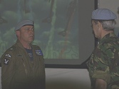 A proud Team Leader, Major Ray Turner, is congratulated by Colonel Paul Edwards at his success in readying the Team for the season