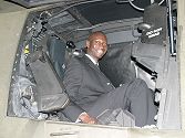 ....and Lamine Gueye of RTM tried out the pilot's seat for size.