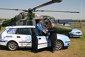 SAAB Operations Manager, Andy Dunston, hands the keys of the Team's new cars to Major George Bacon, SO2 Army Air Corps Displays this year.