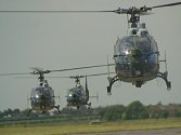 The Gazelles queue up to follow the Lynx into the landing area.