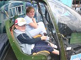 Visitors to the stand's Gazelle cockpit included Bradley and Emily Drake.....