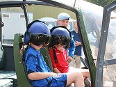 Alex was showing future pilots around the Gazelle cockpit on its new trailer, here James and Matthew Davies enjoy their flight!