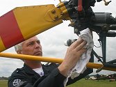 .....while John Marsh checks the control system on the Alouette's tail-rotor.