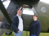 The unusual AHAF aircraft soon attract interested visitors, Chris and Becky Turner....