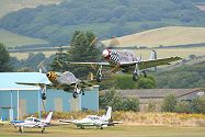 ....Maurice Hammond and Rob Davies in their P-51D Mustangs....